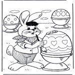 Temas - Conejo de pascua pinta huevos